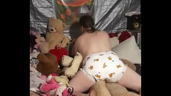 Hot Sissy riding stuffy in a bambino diaper total Tube