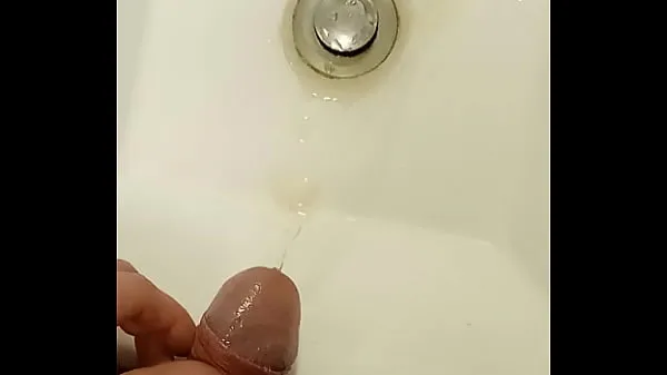College bathroom: Student clamps his urethra and pisses in the sink and often spits on his cock إجمالي الأنبوبة الساخنة